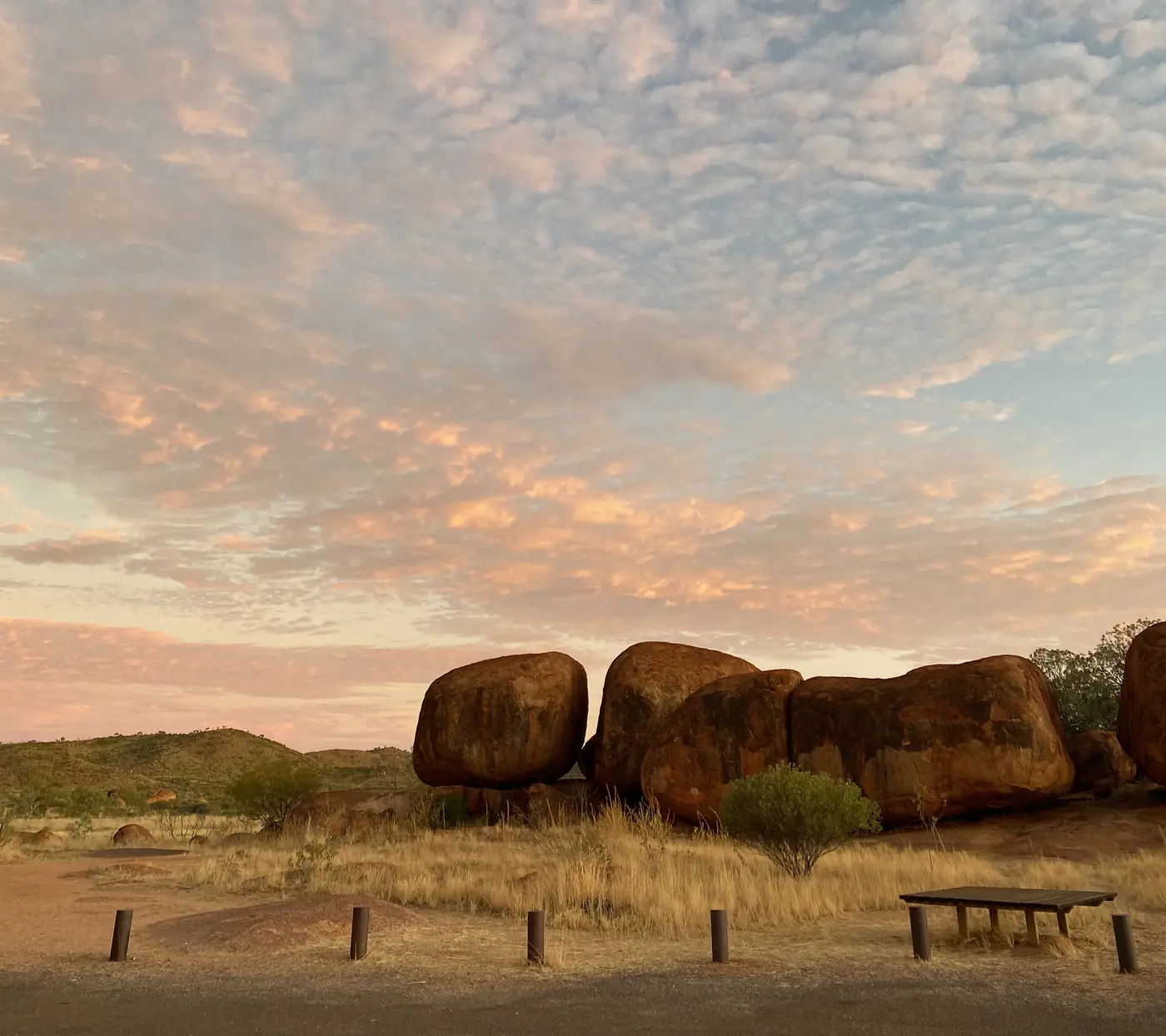 Devils Marbles, granite boulders under a clouded sky